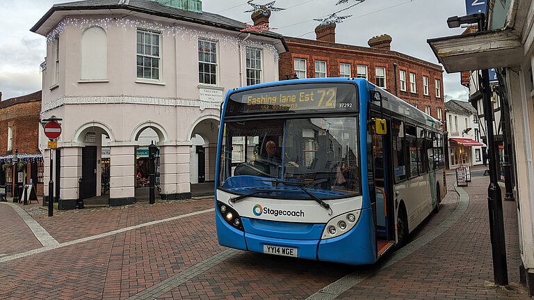 Bus 72 in Godalming High Street parked outside the Pepperpot